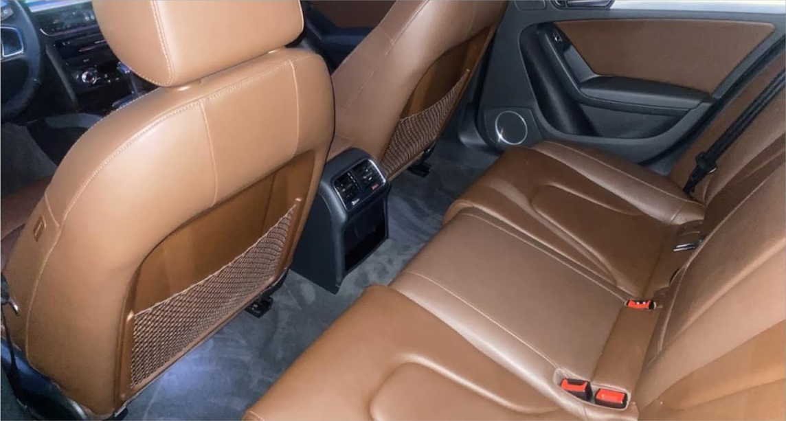 Detailed leather interior — every seam and panel cleaned